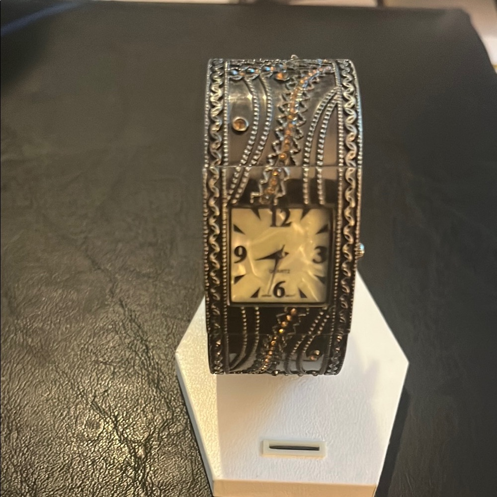 Intricate Black and Silver Watch